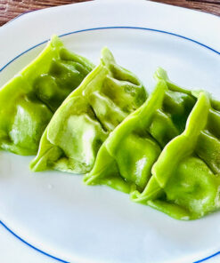 Gyoza met gemengde paddenstoelen en plantaardig vlees (gerstgras)